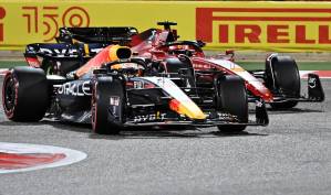 2022 Bahrain GP Verstappen battles Leclerc Turn 1 Photo Red Bull Edited by MAXF1net