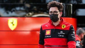 mattia binotto ferrari logo background australia 2022 planetf1
