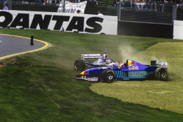 MELBOURNE GRAND PRIX CIRCUIT, AUSTRALIA - MARCH 09: Jacques Villeneuve, Williams FW19 Renault, crashes with Johnny Herbert, Sauber C16 Petronas during the Australian GP at Melbourne Grand Prix Circuit on March 09, 1997 in Melbourne Grand Prix Circuit, Australia. (Photo by LAT Images)