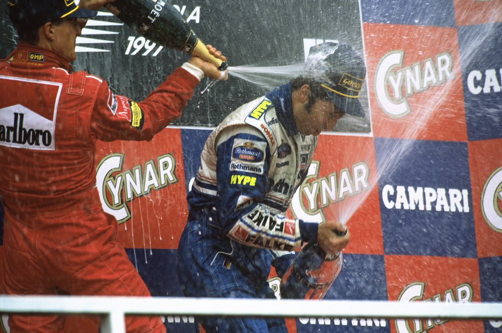 Frentzen e Schumacher festeggiano sul podio