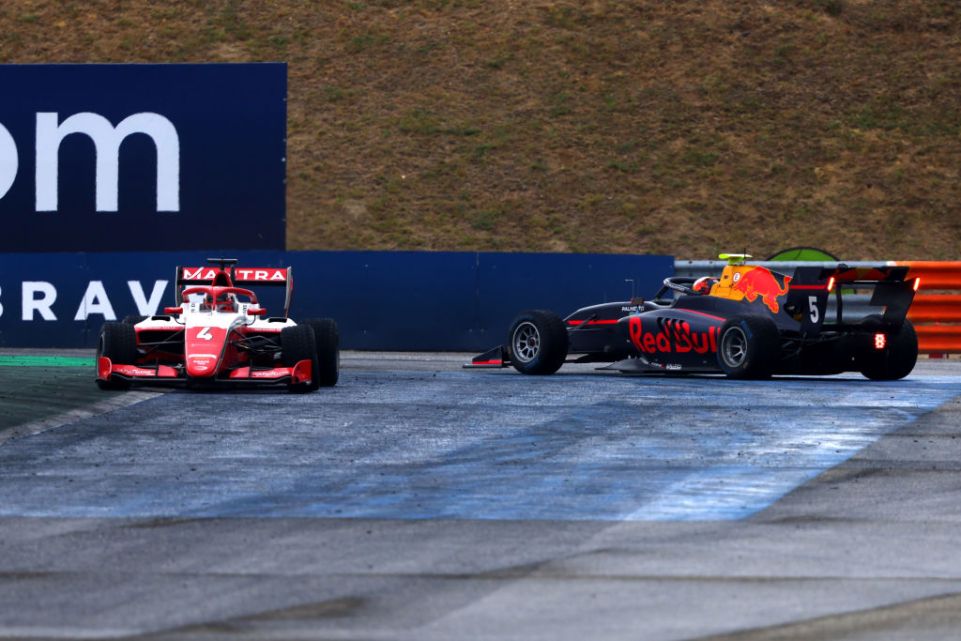 BUDAPEST, HUNGARY - JULY 30: Arthur Leclerc of Monaco and Prema Racing (4) and Jak Crawford of United States and Prema Racing (5) collide during the Round 6:Budapest Sprint race of the Formula 3 Championship at Hungaroring on July 30, 2022 in Budapest, Hungary. (Photo by Bryn Lennon - Formula 1/Formula Motorsport Limited via Getty Images)