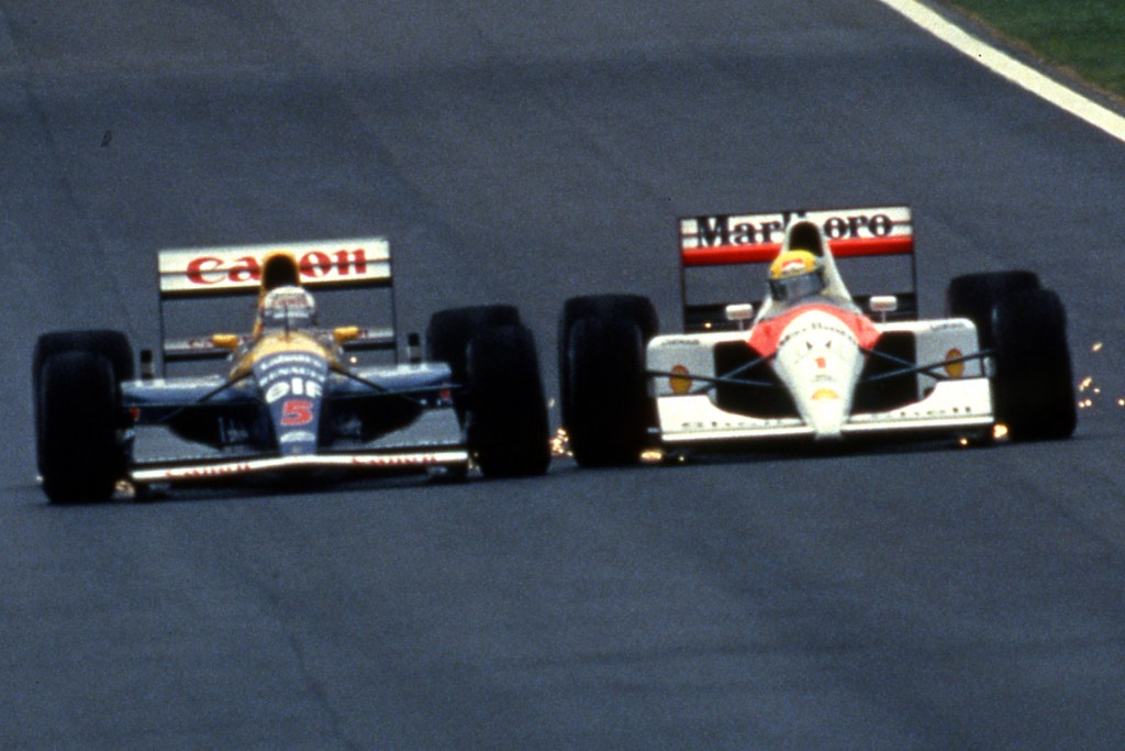 Ayrton Senna da Silva (BRA) McLaren MP4/6 Honda battles wheel to wheel with Nigel Mansell (GBR) Williams FW14 Renault GP SPagna 1992