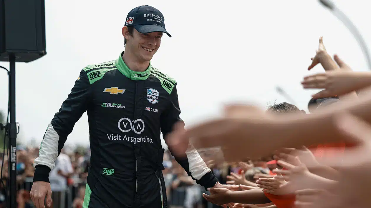 Callum Ilott high fives IndyCar fans during 2023 season