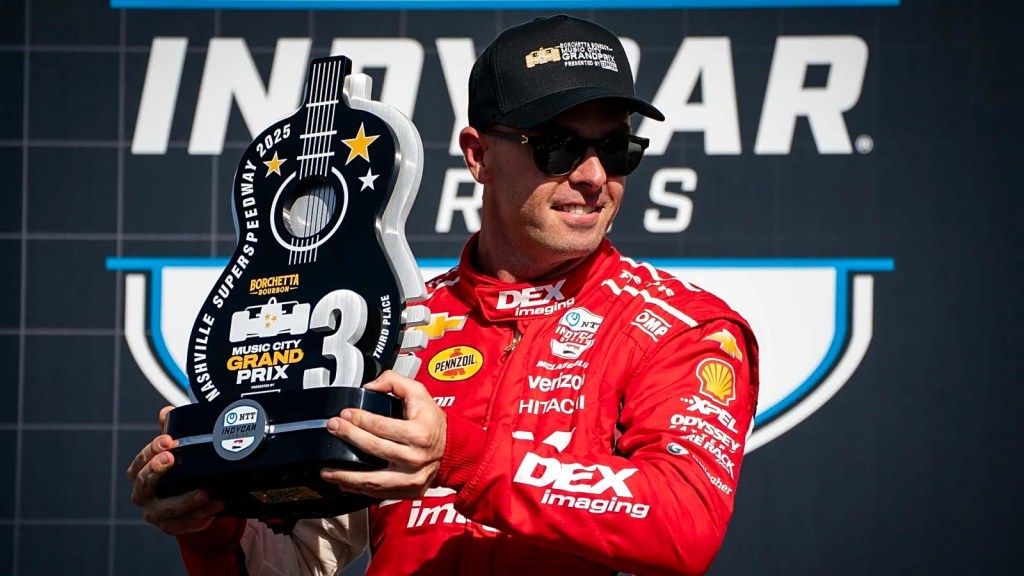 ntt indycar series driver scott mclaughlin holds