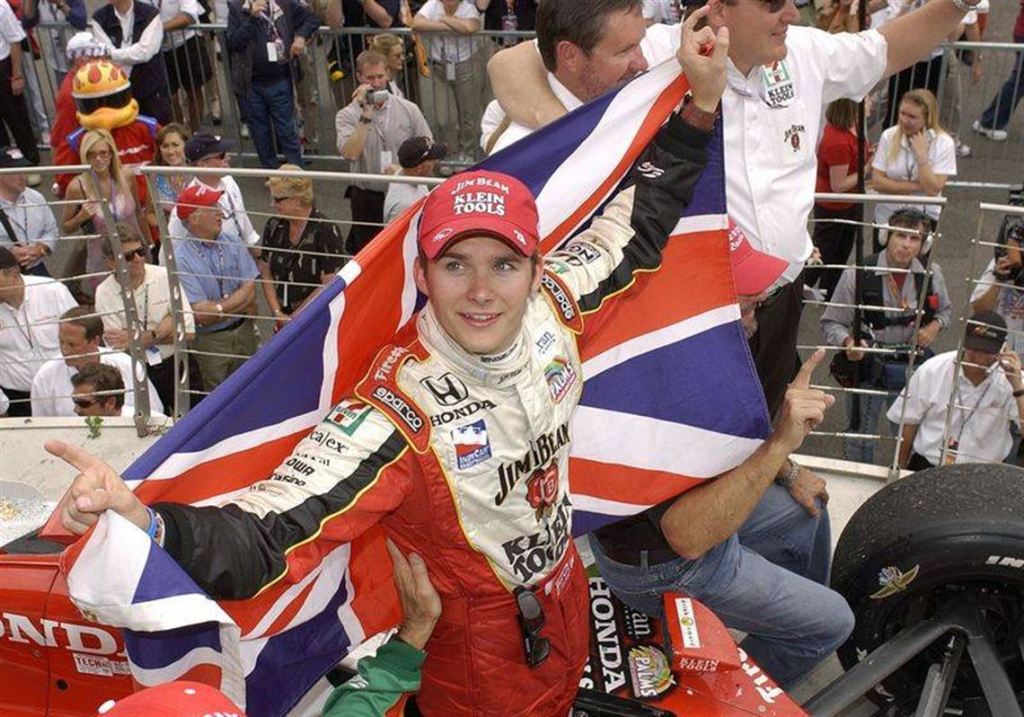 Dan Wheldon celebrates his victory in the Indianapolis 500 1